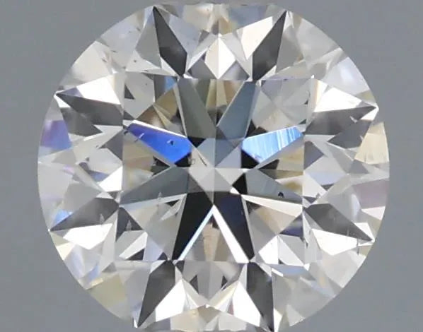 0.58ct Round Natural Diamond (Colour J, Clarity SI1, Cut EX, GIA Certified)