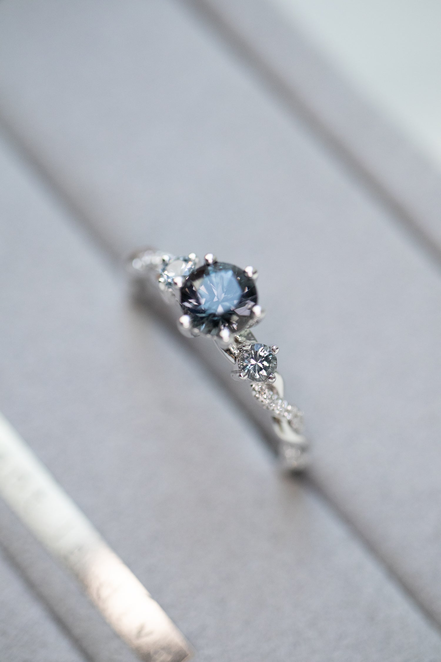 Graylish Spinel 0.55ct & diamonds 18K Gold Half Eternity Twisted Ring