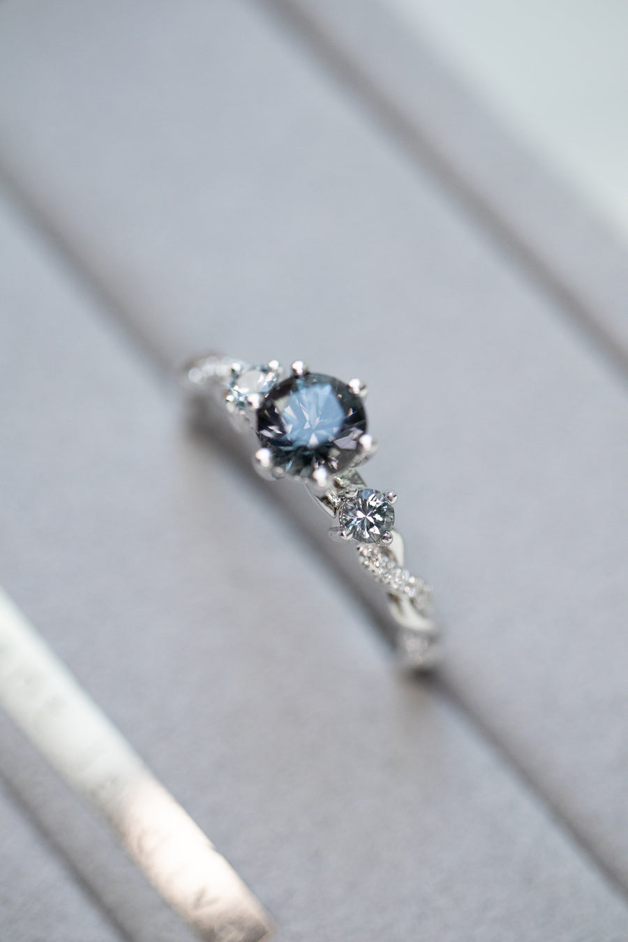 Graylish Spinel 0.55ct & diamonds 18K Gold Half Eternity Twisted Ring
