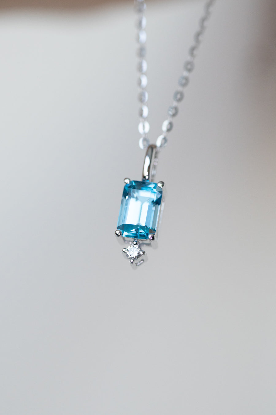 Lightly Swiss Blue ~0.70carat Emerald Cut Topaz and 0.02carat diamond 18K White Gold Necklace