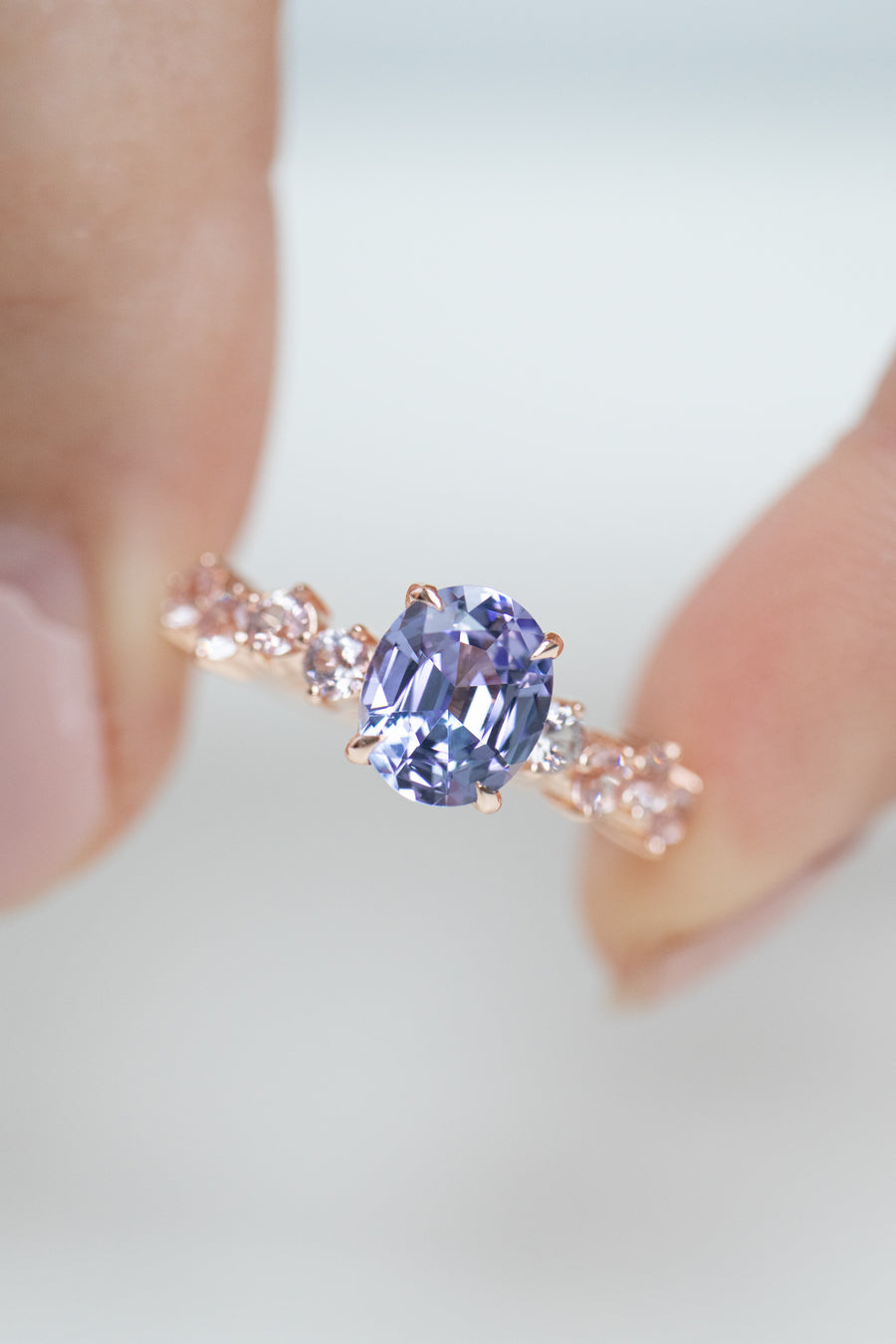 1.20carat Oval Tanzanite and total 0.60carat Pink Spinel 18K Rose Gold Ring