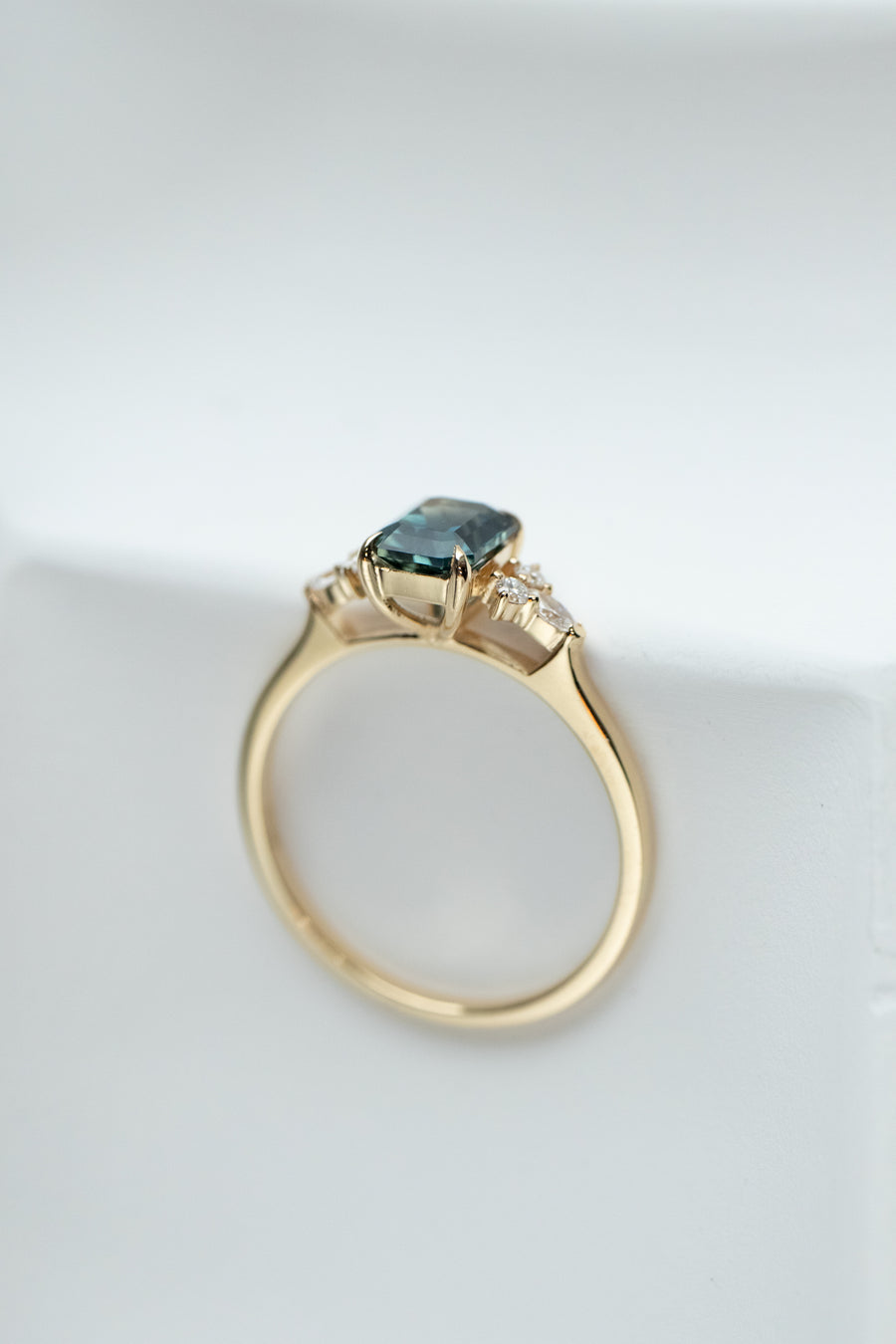 1.06carat Radiant Teal Green Sapphire (Unheated with Certificate) & total 0.13carat Round and Marquise Diamonds 18K Yellow Gold Ring
