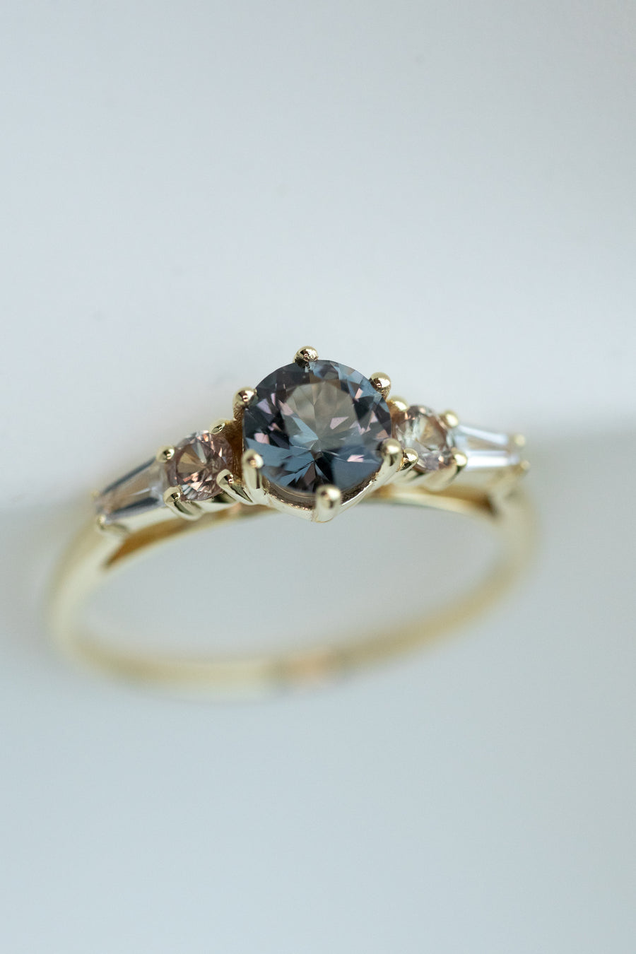 0.57ct Round Brown Gold Spinel & Total 0.27ct Round and Tapered Baguette Sapphires 14K Yellow Gold Ring