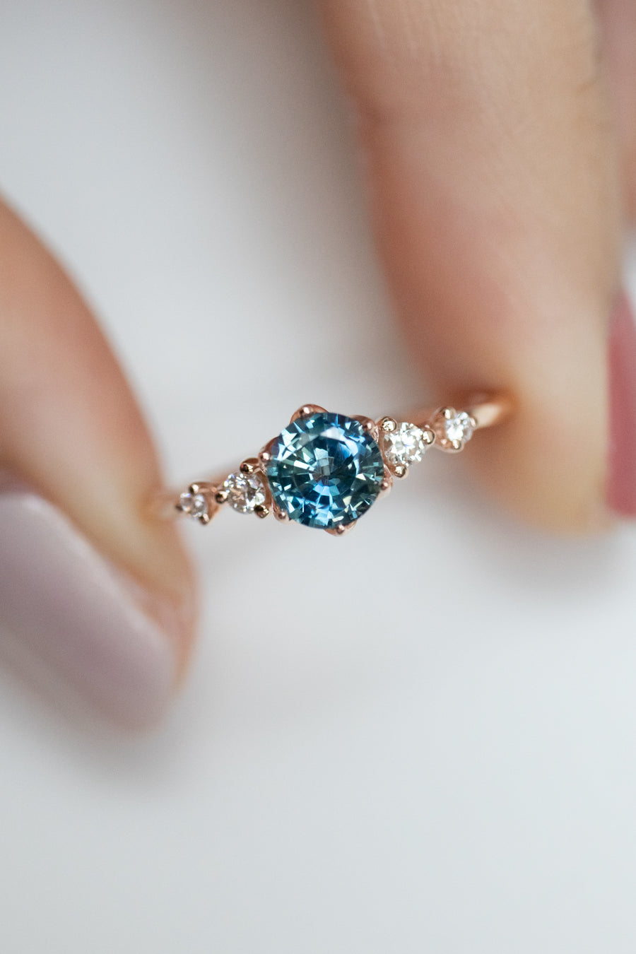 ~0.60-0.7ct Unheated Round Teal Sapphire & 0.10ct Diamonds 18K Rose/ Yellow/ White Gold Ring