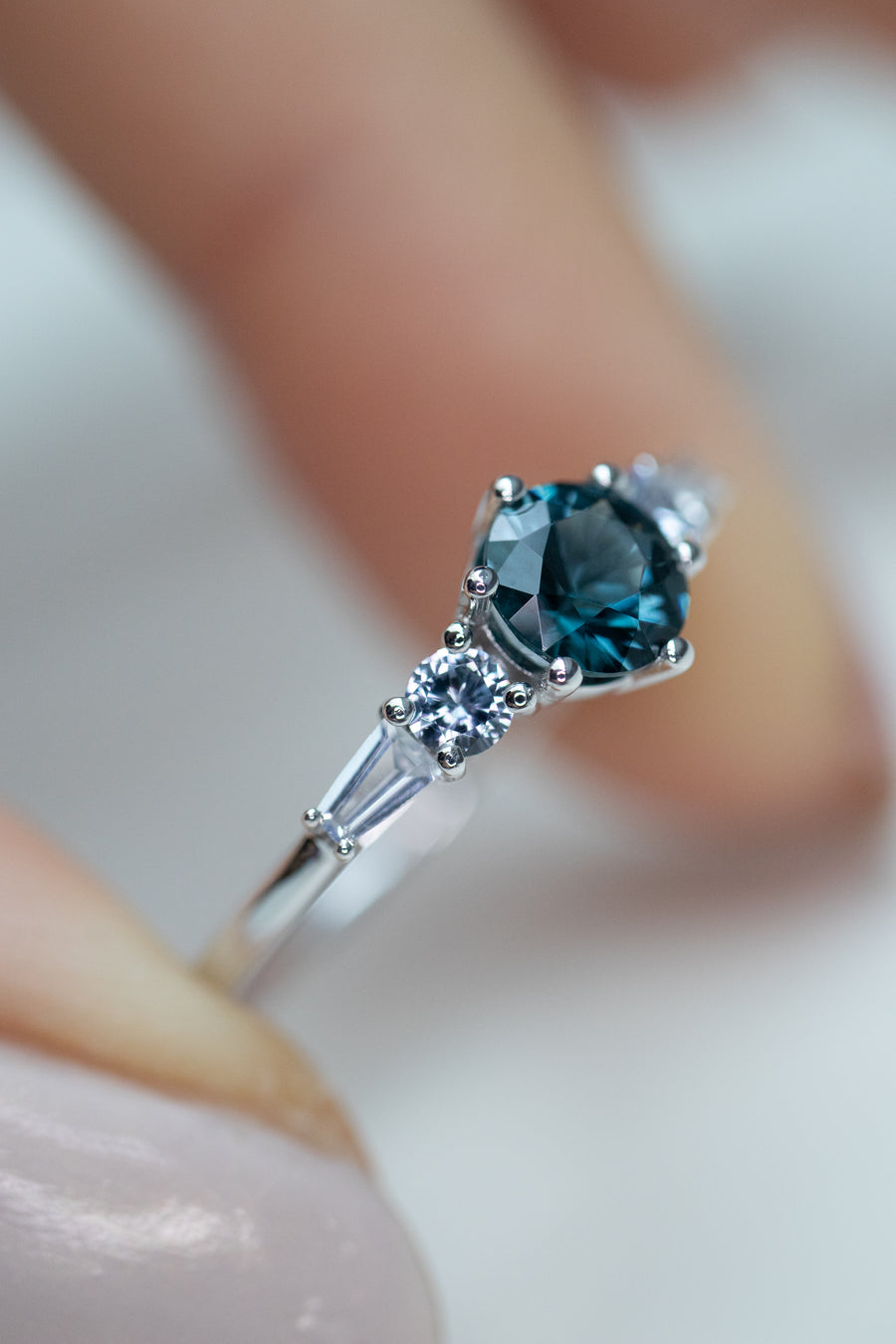 0.50ct Round Teal Spinel & Total 0.27ct Round and Tapered Baguette Sapphires 14K White Gold Ring
