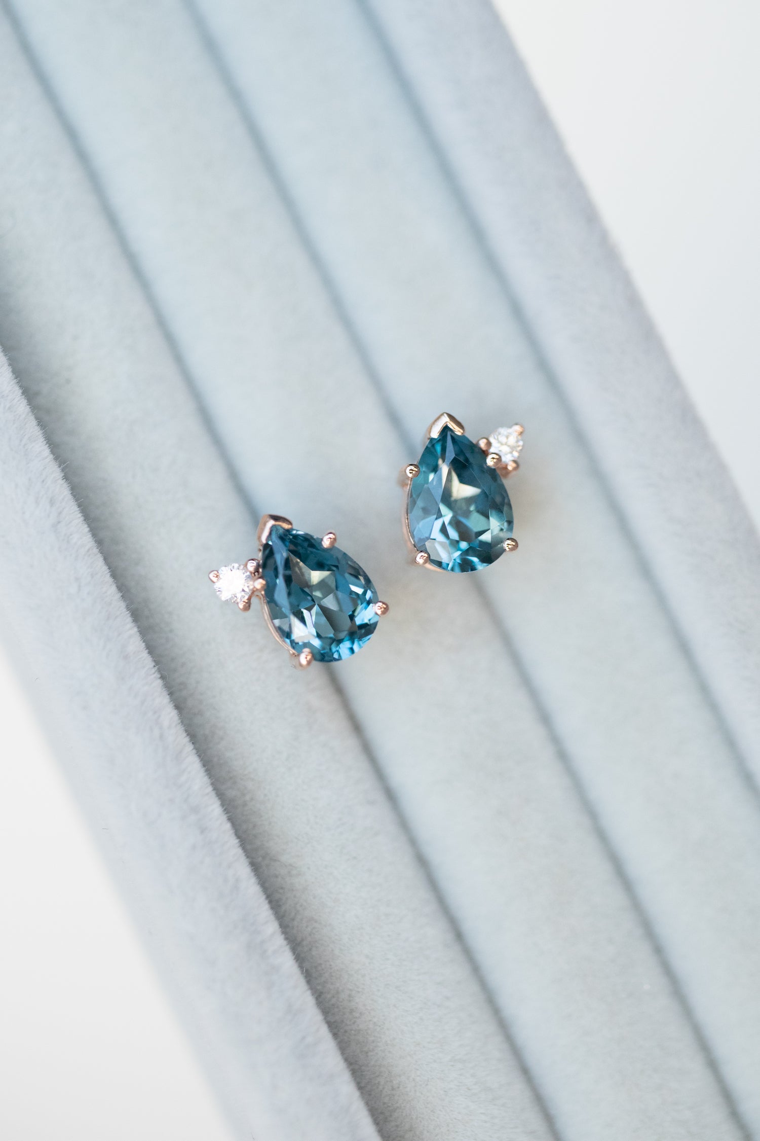 Larme Swiss Blue Topaz 0.80+0.80ct & diamonds in 14/18K Stud Earrings